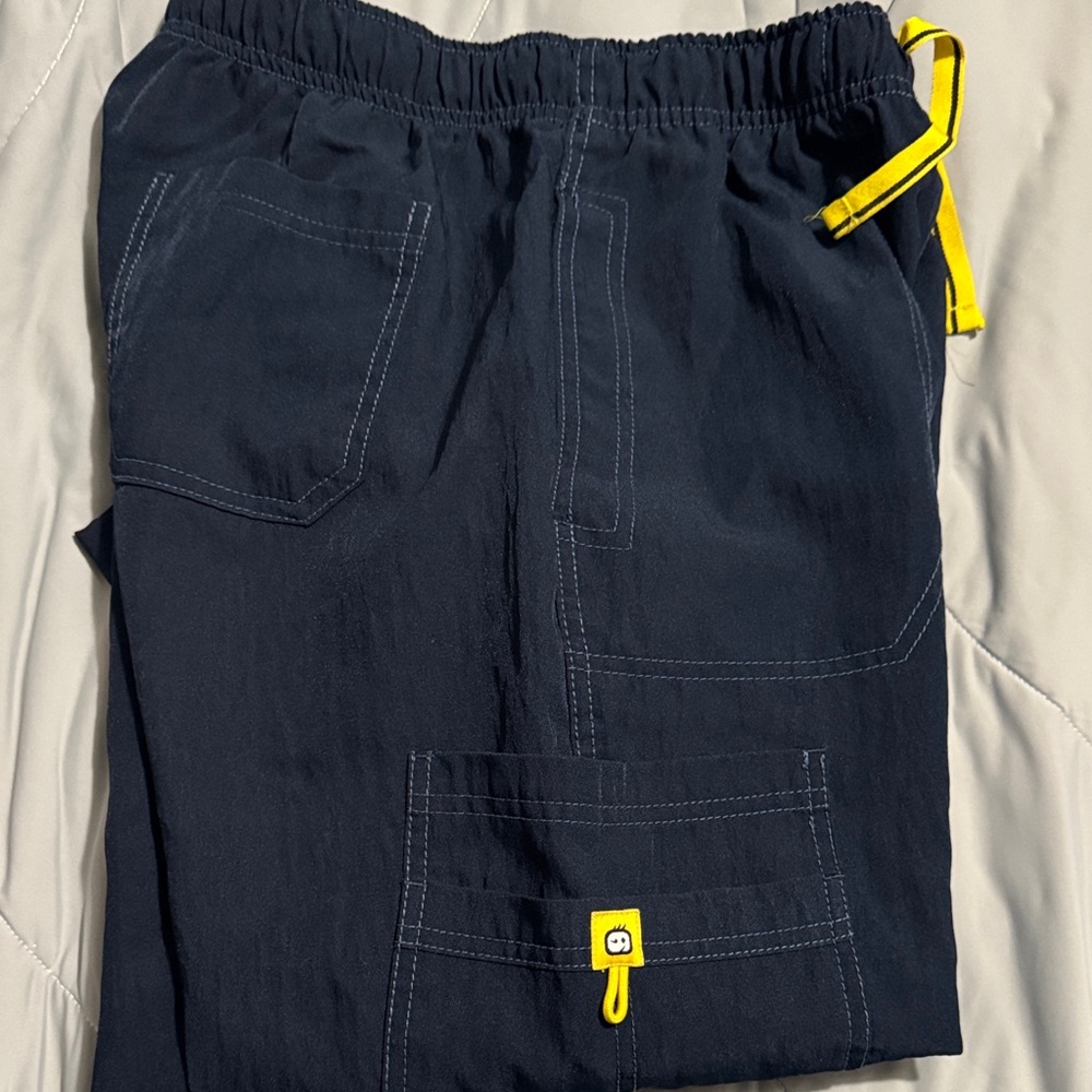 Spread good cheer scrubs Navy with Yellow Accents